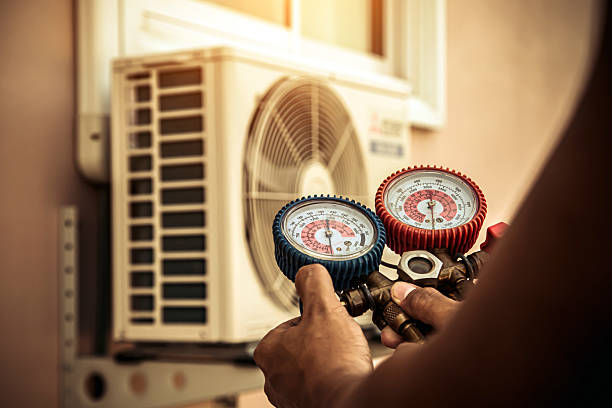 Professional Air Conditioning Service technician working in Apple Grove, WV